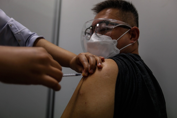 Nearly 90pc of adults in Malaysia have received at least one COVID-19 vaccine dose