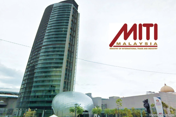 MITI reverses decision on twice-weekly COVID-19 tests for factory workers